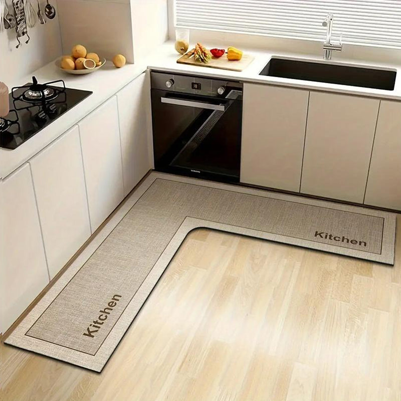๐ง Stop slipping on wet kitchen floors โ this L-shaped mat absorbs water and oil fast, stays put, and cushions your feet while you cook. ๐