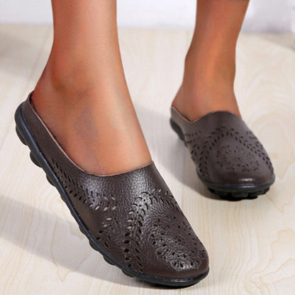 Loose-fitting slippers with a floral cutout, suitable for all foot types