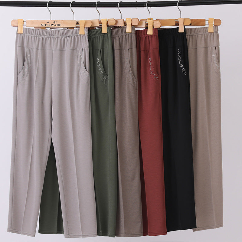 Pantalon de cheville à taille élastique de couleur unie avec poches